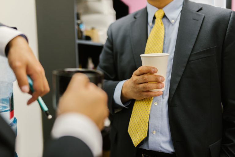 business professionals in conversation at corporate gathering
