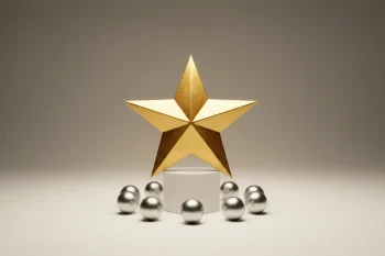 Gold star on a white pedestal encircled by small silver spheres on a soft neutral background.